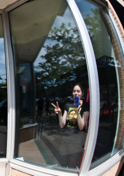 Activist Nicole Seguin inside the Minister's office before being arrested by police.